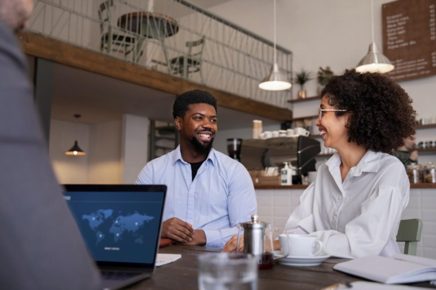 Student reviewing financial documents and charts during remote study session
